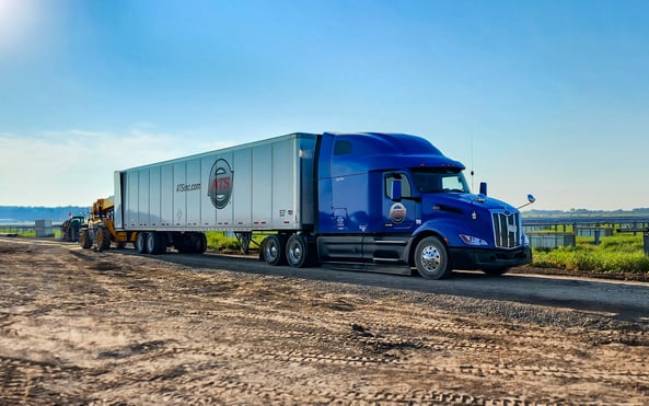 ATS dry van semi-truck parked at job site; best dry van trucking companies; Anderson Trucking Service