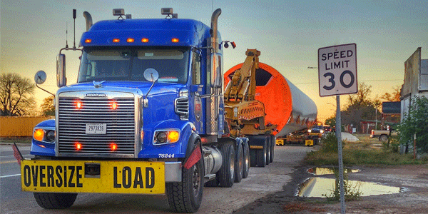 ATS semi hauling an oversized load. The best heavy haul trucking companies in 2026.
