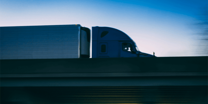 18 wheeler driving on an overpass; best dry van trucking companies; ATS; Anderson Trucking Service
