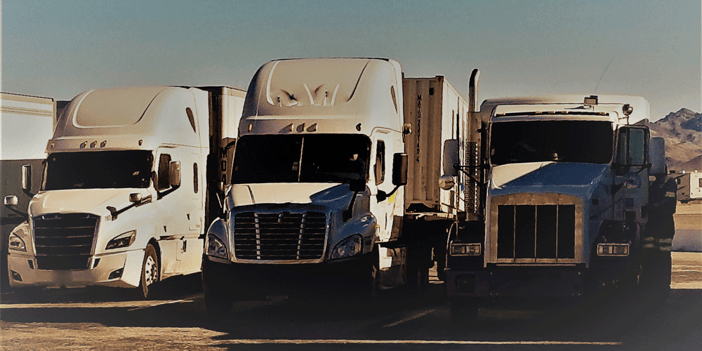 Three white trucks in a line, why truck drivers shouldn't boycott freight, ATS