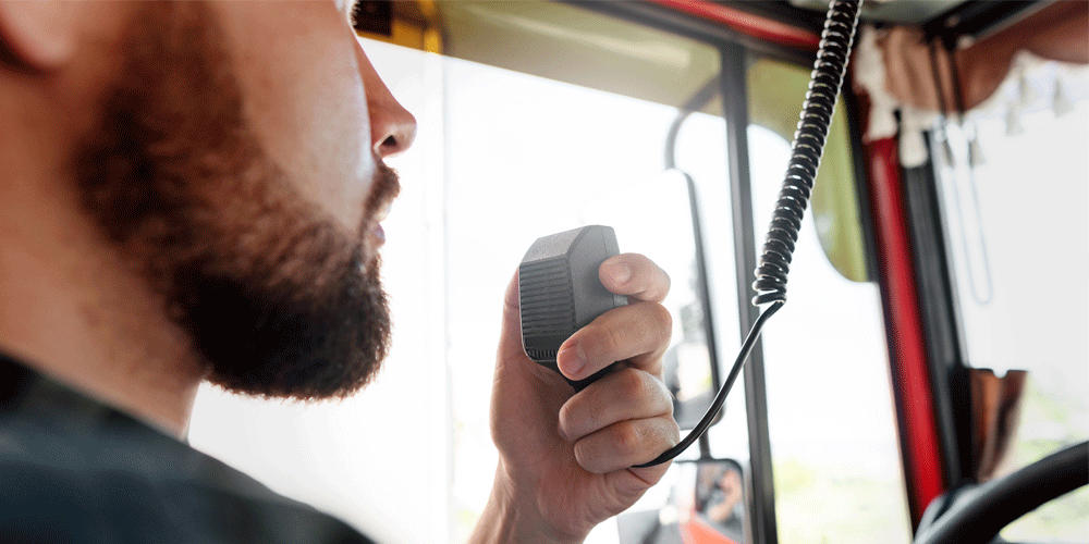 Driver talking on CB radio.