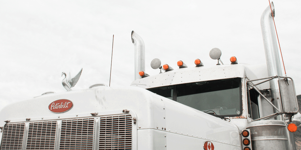 Zoomed in view of a white Peterbilt hood