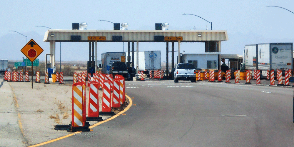 Trucks and cars approaching the border.