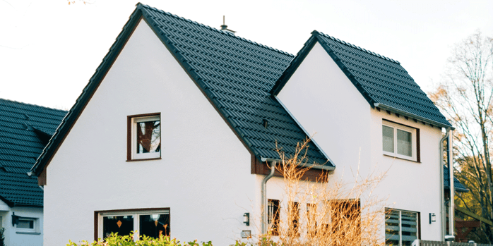 White home with dark shingles, support resources for truck drivers, ATS, Anderson Trucking Service
