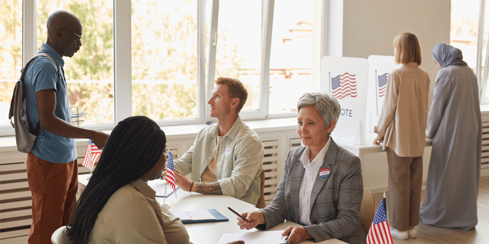 People registering to vote at a polling place.