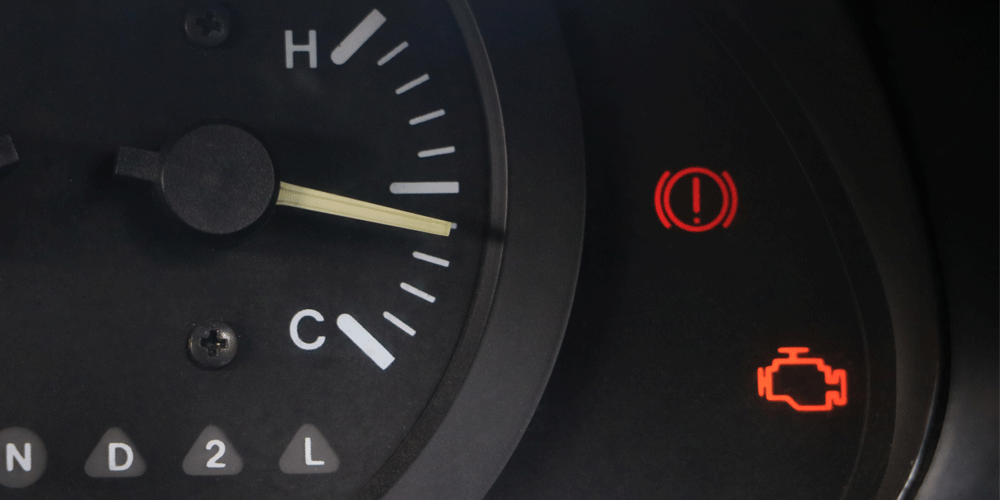 Dashboard with warning lights illuminated.