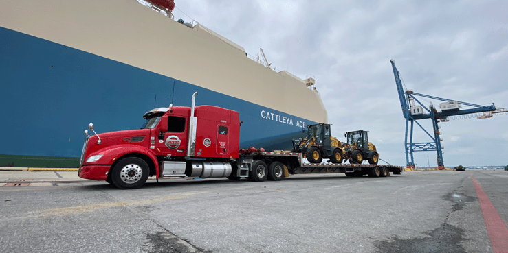 ATS flatbed truck at a port; TWIC card guide for truck drivers; Anderson Trucking Service