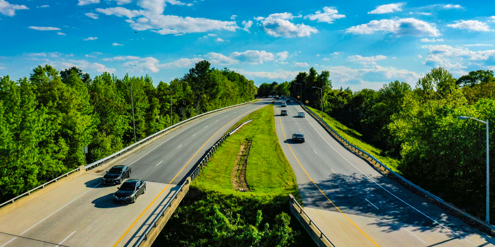 Aerial shot of two two-land roads.