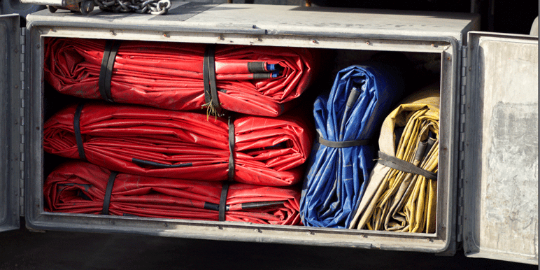 Tarp-Rack, tarping a flatbed truck load