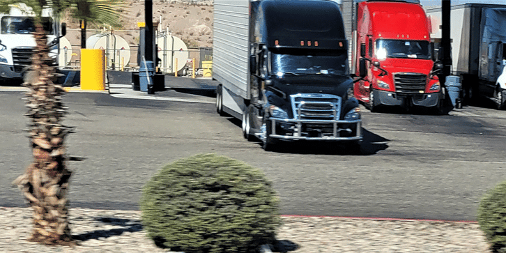 Truck pulling out of truck stop and away from fuel pump, how to run a successful trucking business, ATS, Anderson Trucking Service