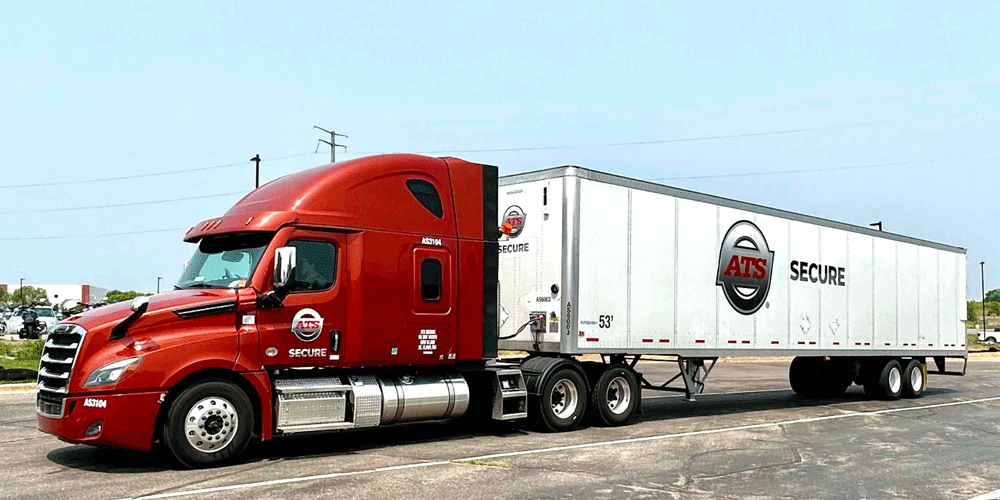 Red ATS Secure semi-truck with attached dry van trailer.