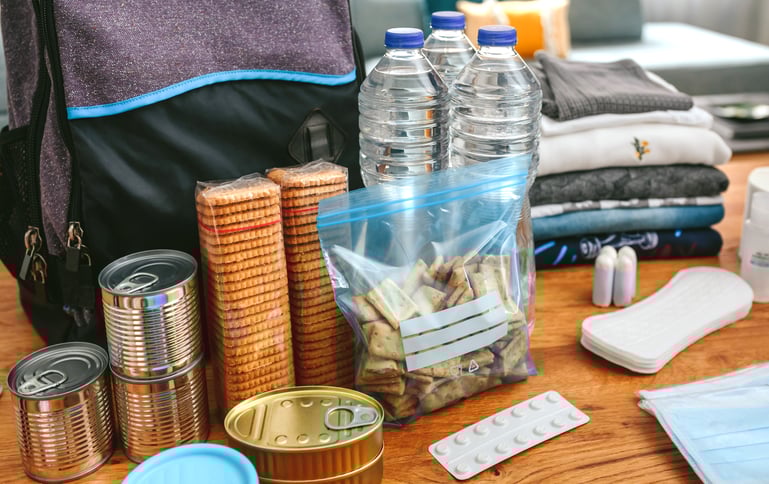 Extra shelf-stable food and other supplies for a truck driver emergency kit